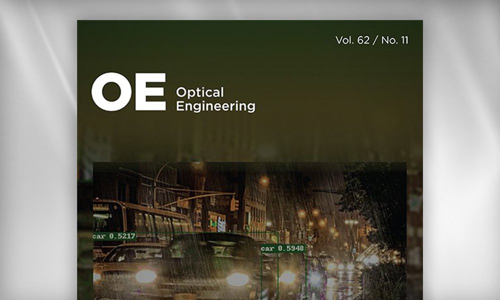SPIE Journal cover of OE: Optical Engineering showing a nighttime urban street scene with cars and headlights, overlaid with green detection boxes representing computer vision analysis.